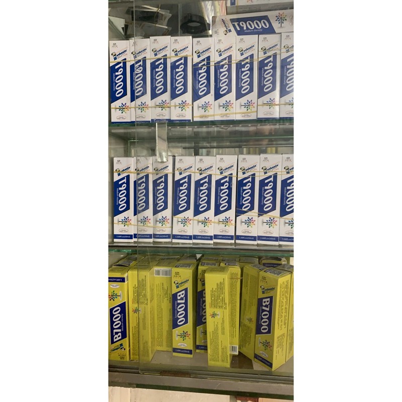 Keo dán điện thoại T-7000  T9000  B7000  E8000 chai lớn 50ml