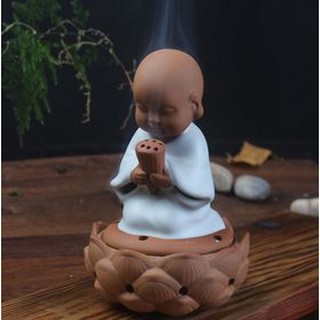 Tượng chú tiểu đốt trầm