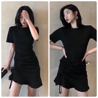 Đầm đen rút eo