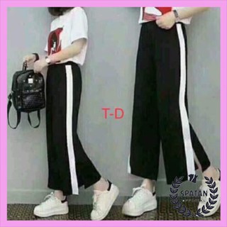Quần ống rộng xẻ gấu Thu