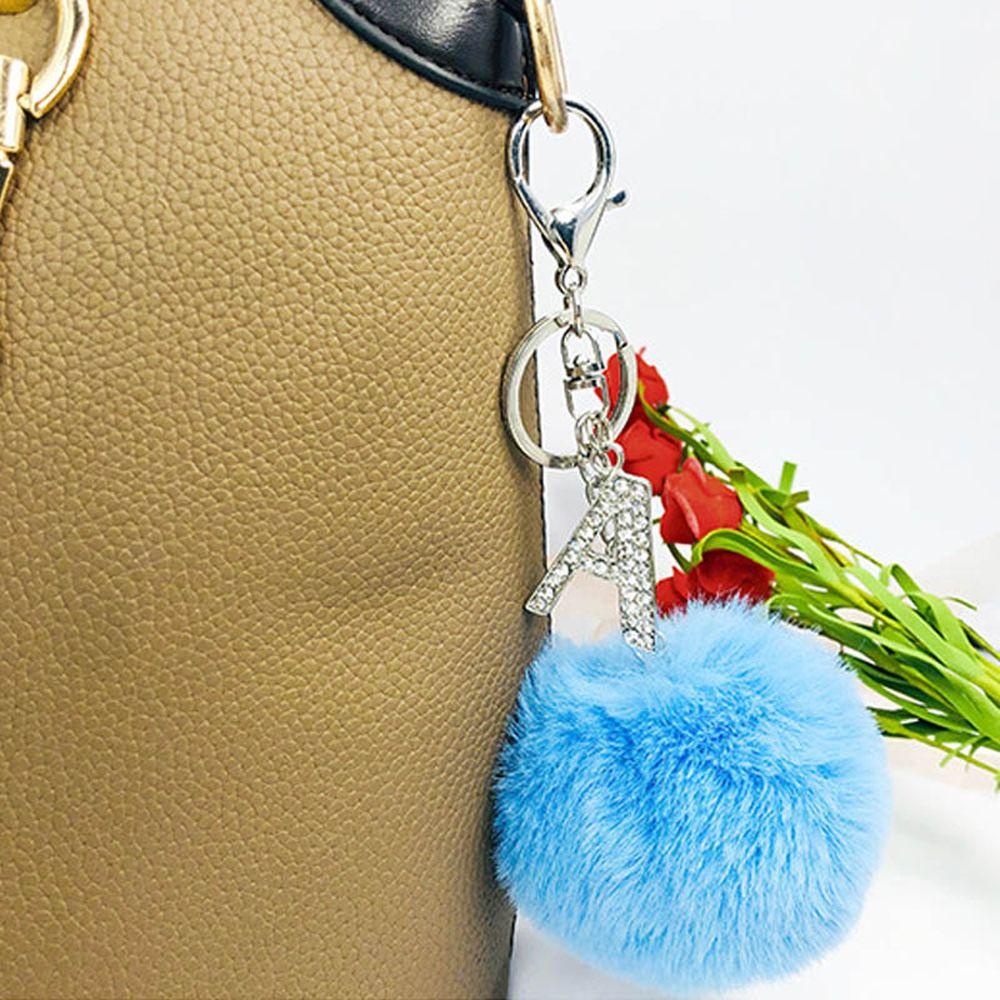 Móc Khóa Hình 26 Chữ Cái Đính Bóng Lông Thỏ Phối Tua Rua Thời Trang REBUY1