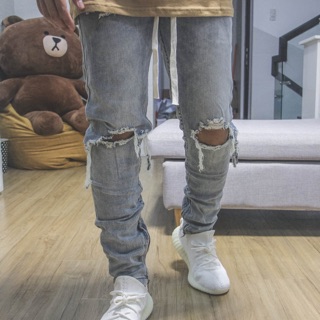 Light blue acid waxed jeans