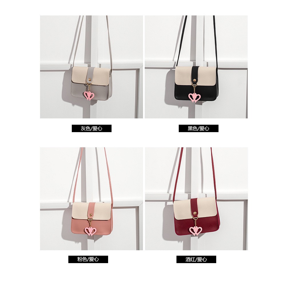 Túi đeo chéo da mềm đính núm tua nữ tính