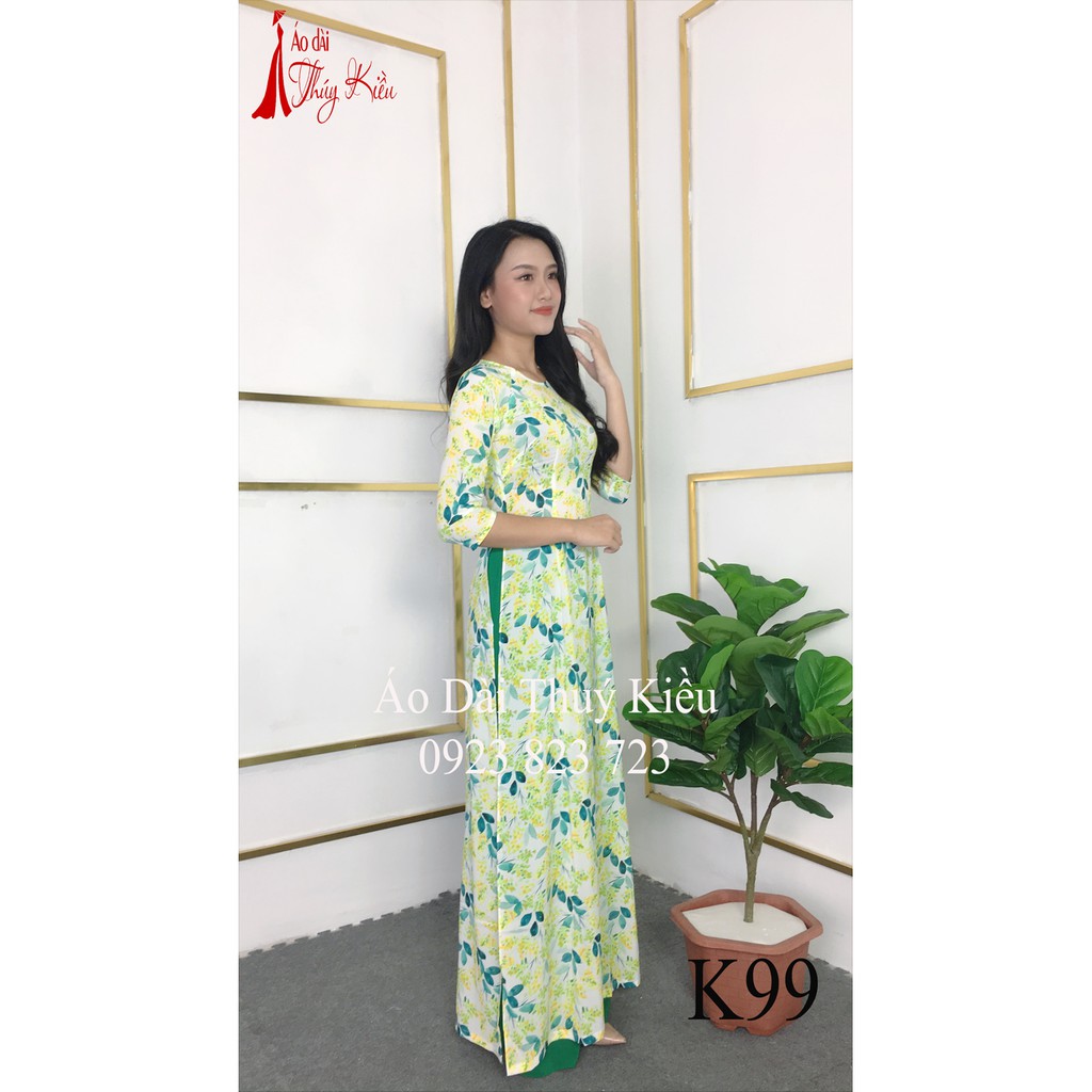 Áo dài Thúy Kiều in 3D lụa Nhật nền trắng hoa vàng xanh K99