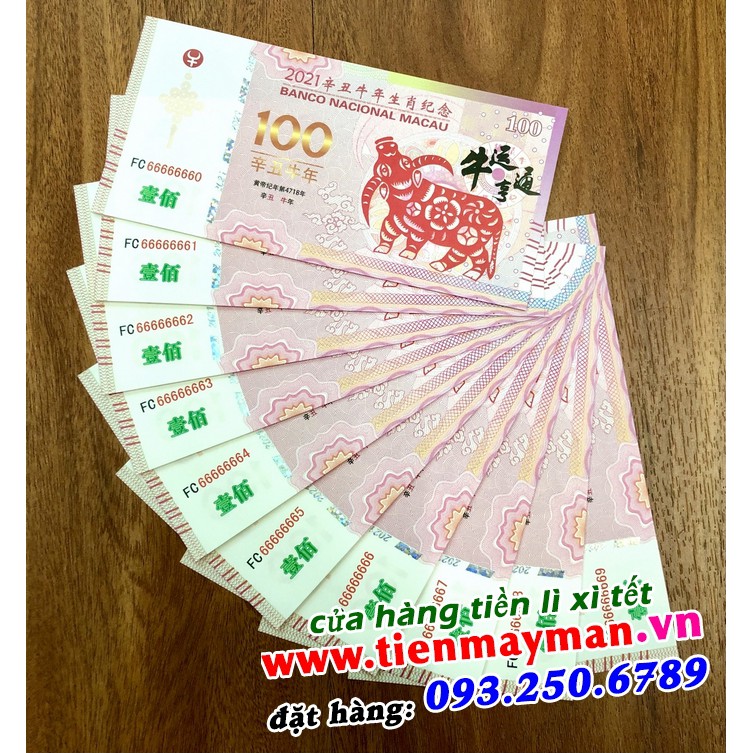 tờ tiền 100 Đô của Macao hình con trâu lì xì tết 2021