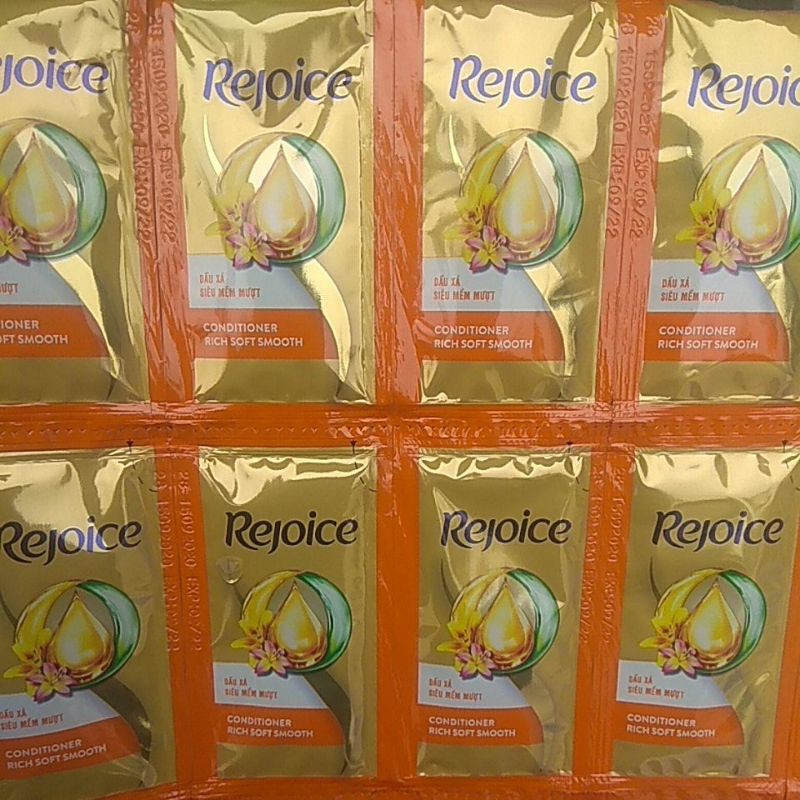 Dây 12 gói dầu xả Rejoice Siêu mềm mượt gói 6g