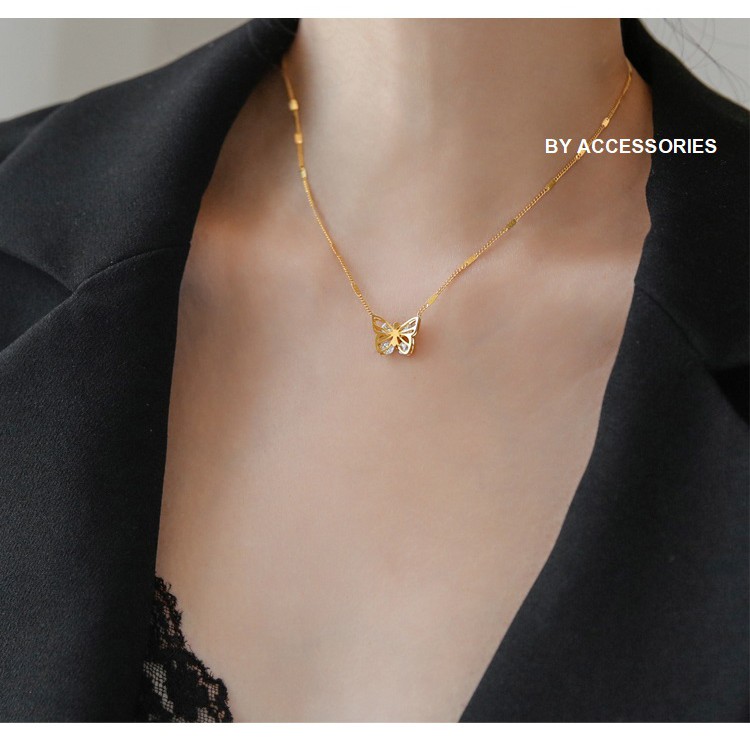 Dây chuyền titan bươm bướm rỗng lồng đá lấp lánh không gỉ