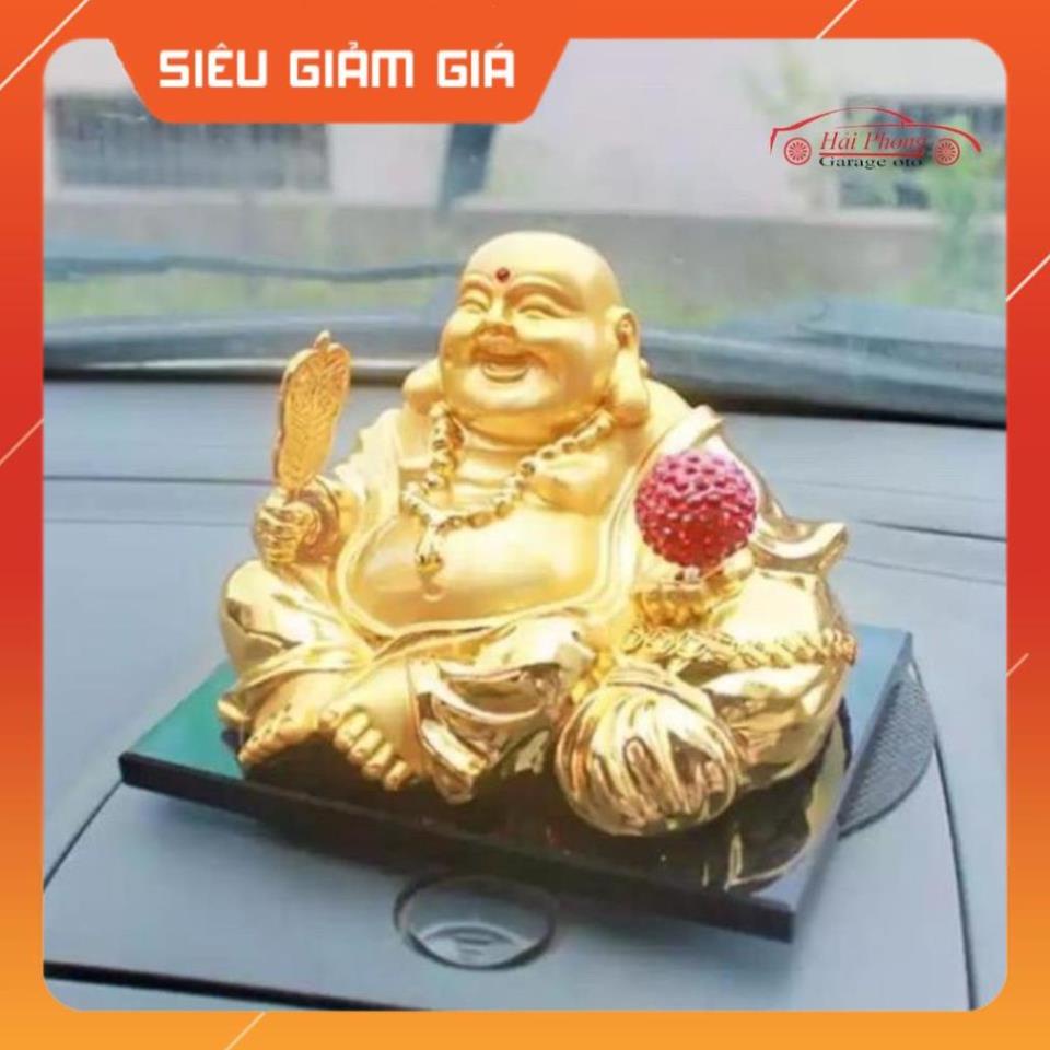 Tượng phật ông di lặc đặt taplo có quả cầu xoay năng lượng mặt trời