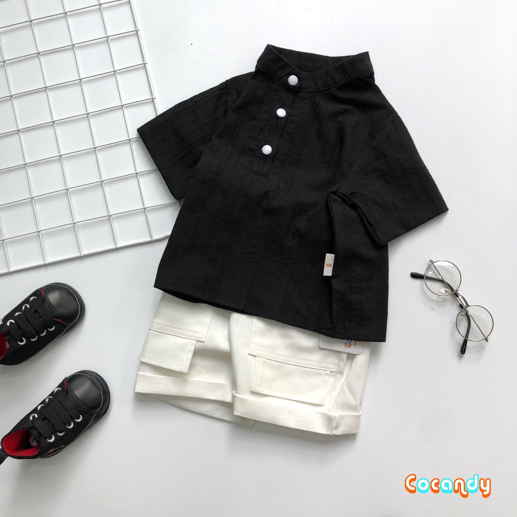 Set đồ cho bé -Áo sơ mi đen cộc tay và quần kaki trắng cho bé của COCANDY mã AS103104, QK102100