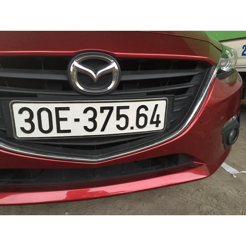 Nắp nhựa tam giác mặt calang Mazda3 2015-2019