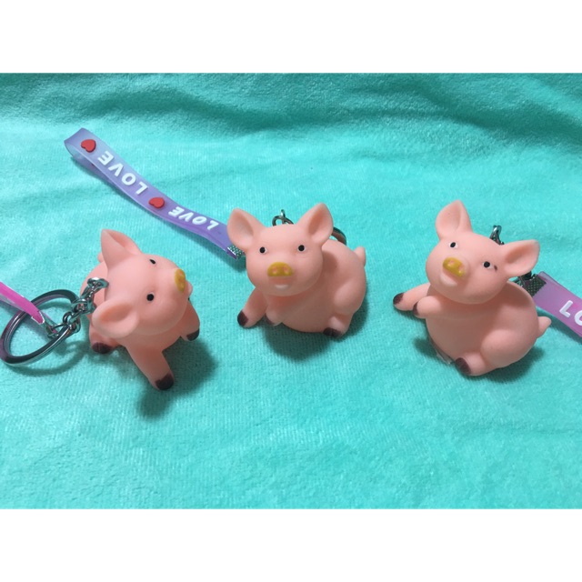 Móc khoá heo bóp kêu