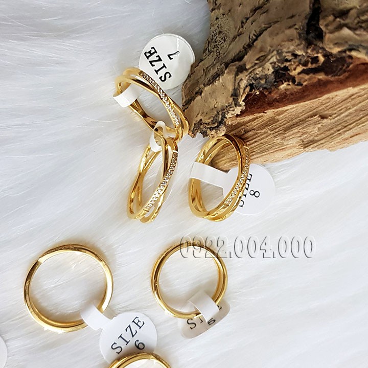 Nhẫn nữ, nhẫn titan chéo đính đá viên nhỏ.