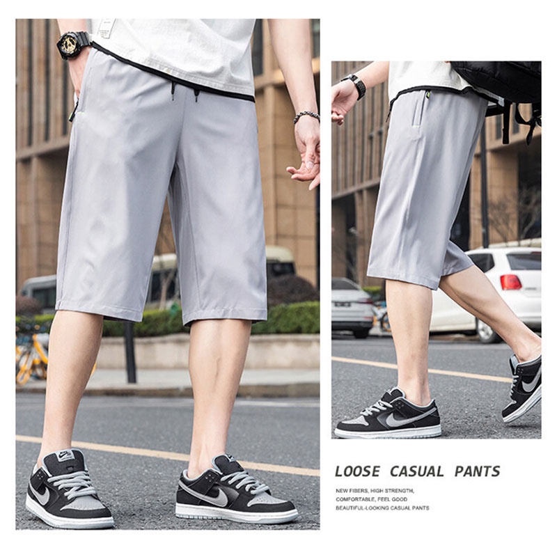 Quần Short Thể Thao Ống Rộng Màu Sắc Trơn Nhanh Khô Có Túi Khóa Kéo Thời Trang Mùa Hè Dành Cho Nam