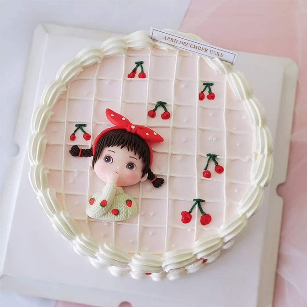 Mô hình bé gái mặc áo len thắt nơ 3D dễ thương trang trí bánh kem