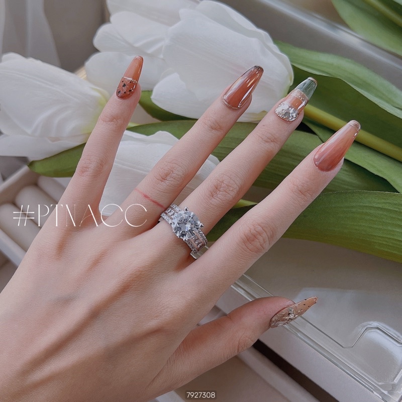 Nhẫn xi bạch kim đá tròn, nhẫn nữ đính đá đơn giản .PTNACC.