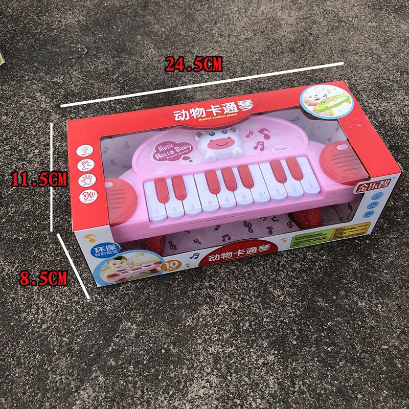 Combo 1 đàn piano cho bé + 1 sư tử chạy dây cót