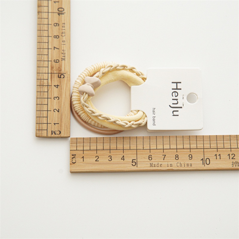 Bộ 4 Dây Buộc Tóc Cao Su Co Giãn Đính Bóng Lông Hoạt Hình Đơn Giản Cho Nữ