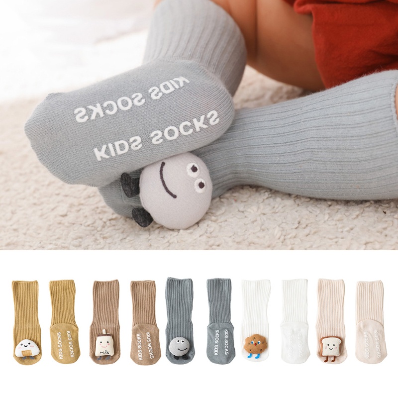 Đôi vớ cotton dài đến đầu gối màu trơn thoáng khí chống trượt họa tiết hoạt hình cho bé