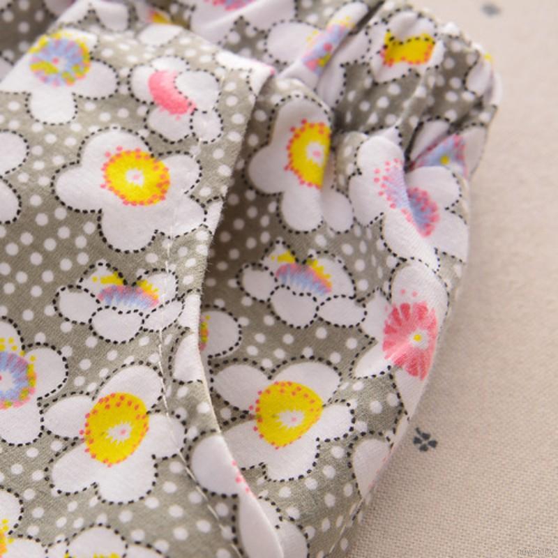 Áo thun sát nách thắt nơ + quần short hoa cho bé gái