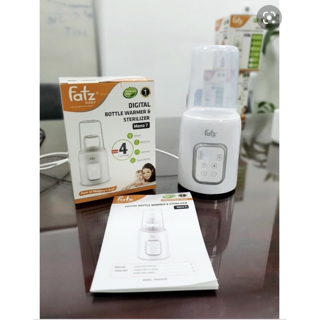 Thanh lý xe đẩy Combi tặng kèm combo máy hâm sữa và máy làm ấm khăn ướt fatz nguyên box