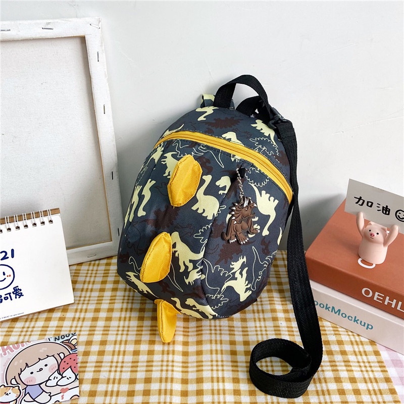 Ba Lô Đi Học Chống Thất Lạc Hình Khủng Long Dễ Thương Cho Bé 1-3-6 Tuổi