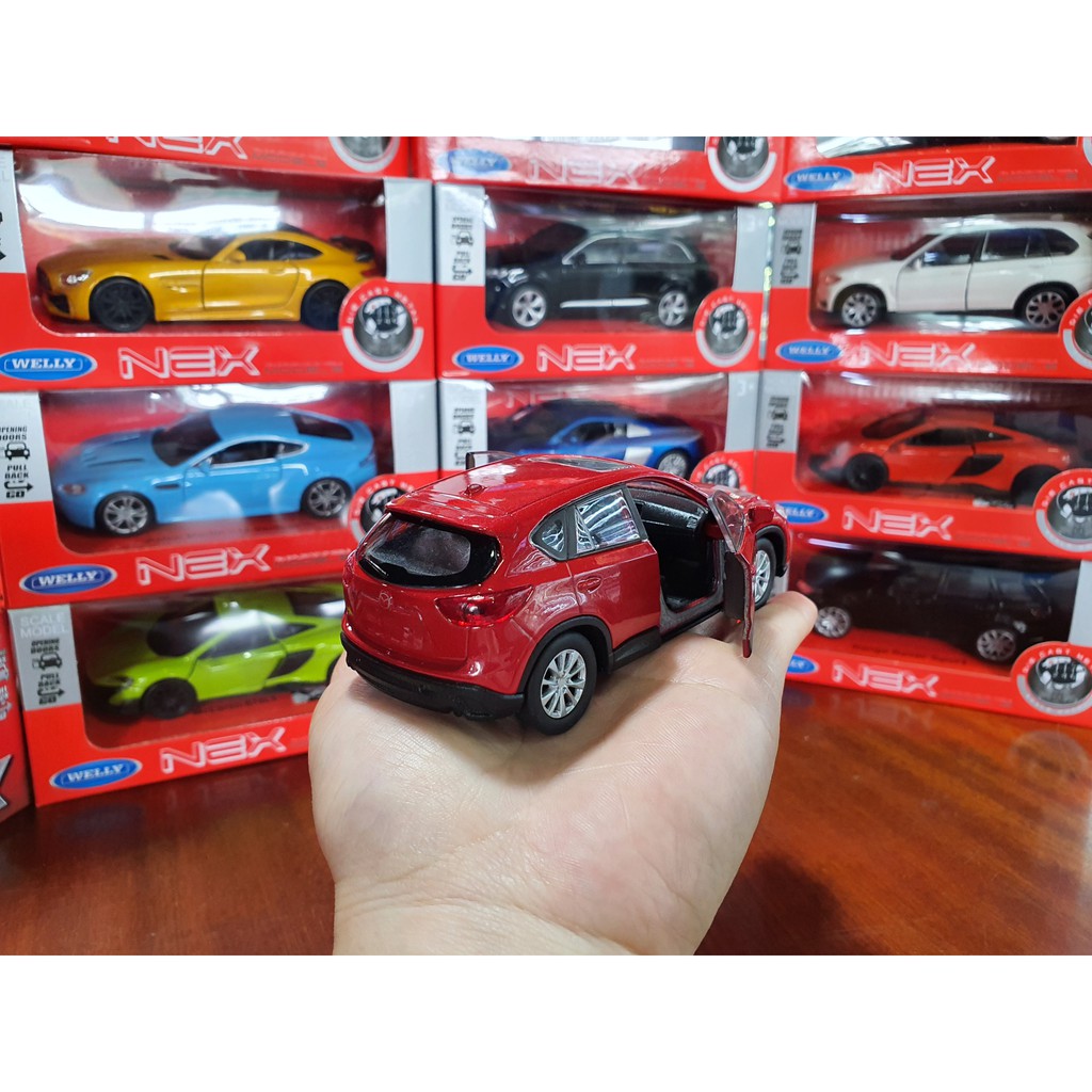 Xe Mô Hình Mazda CX-5 1:34 Welly ( Đỏ )