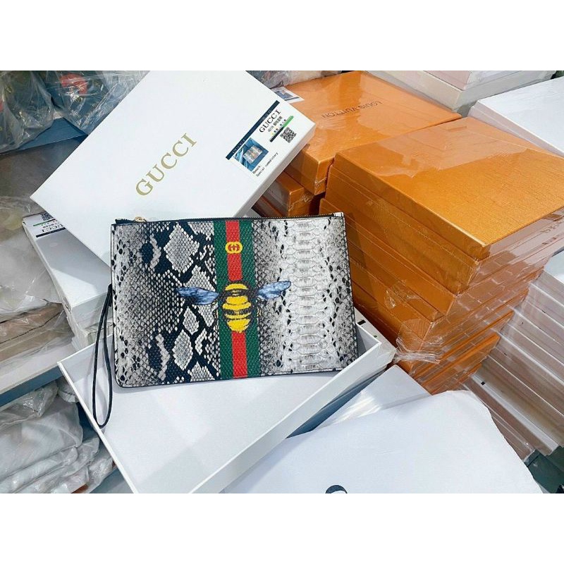 TÚI CLUTCH GC VÂN RẮN LOANG SIZE 28 UNISEX