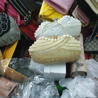 Cốp đá cầm tay đeo chéo