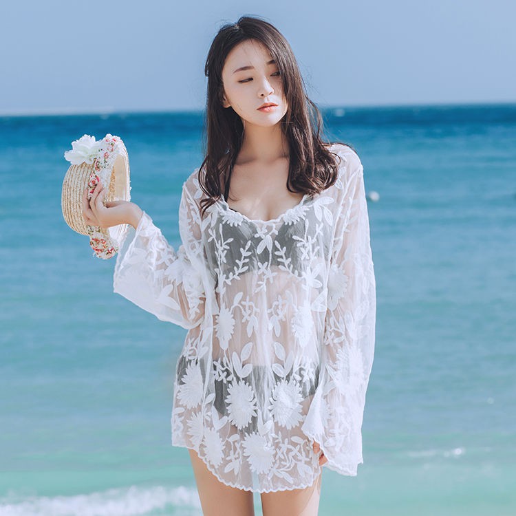 Spot sale white hollow loose see-through lace beach jacket mid-length long-sleeved sunscreen sexy swimsuit blouse single top