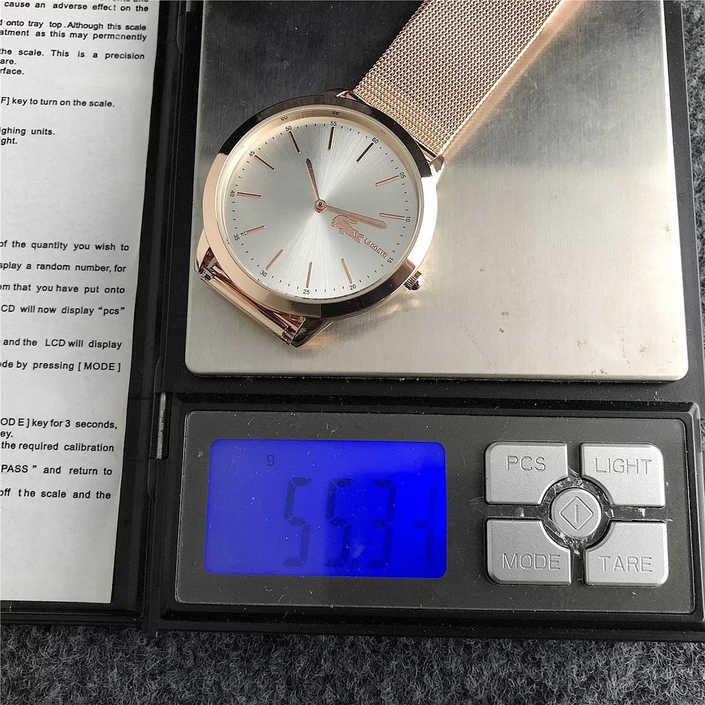 Đồng Hồ Đeo Tay Lacoste Mặt Tròn Đính Kim Cương Dây Da Dành Cho Cặp Đôi