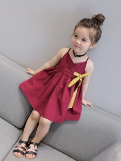 Đầm thoi 2 dây đính nơ vàng