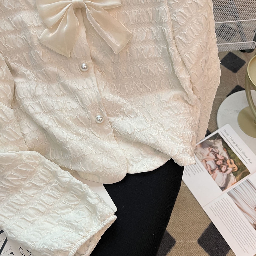 Áo Sơ Mi Tay Phồng Cổ Chữ V Thắt Nơ Dập Nổi Họa Tiết Mới Dành Cho Bạn Nữ