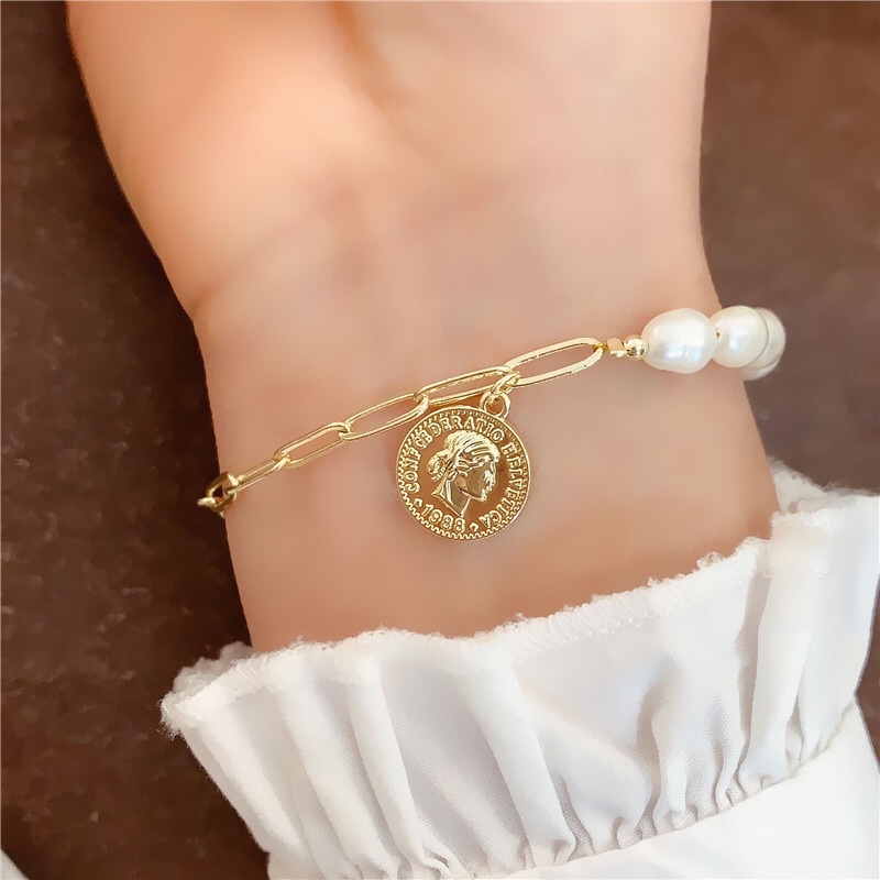 Vòng tay titan mix đồng xu