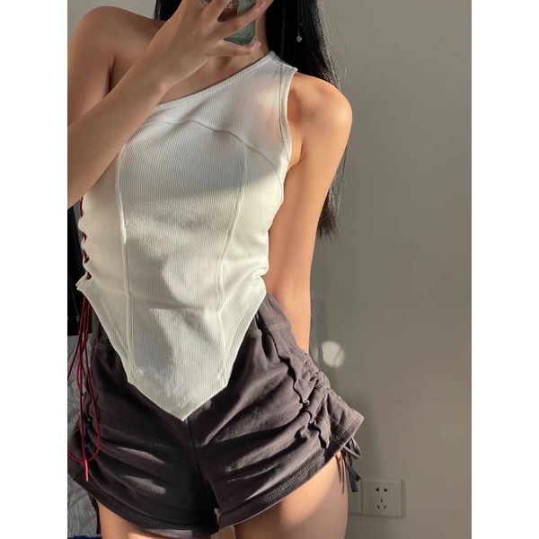 Áo trắng kiểu lệch vai, thắt dây tôn eo siêu lạ - meadow.clothing
