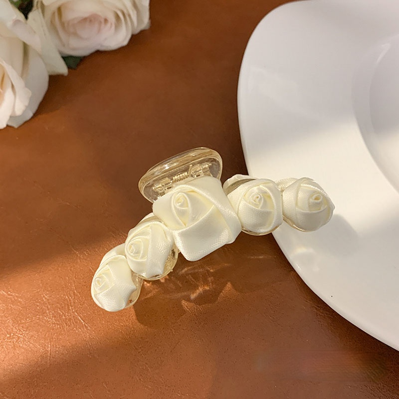 Three-dimensional rose bow lace gripper