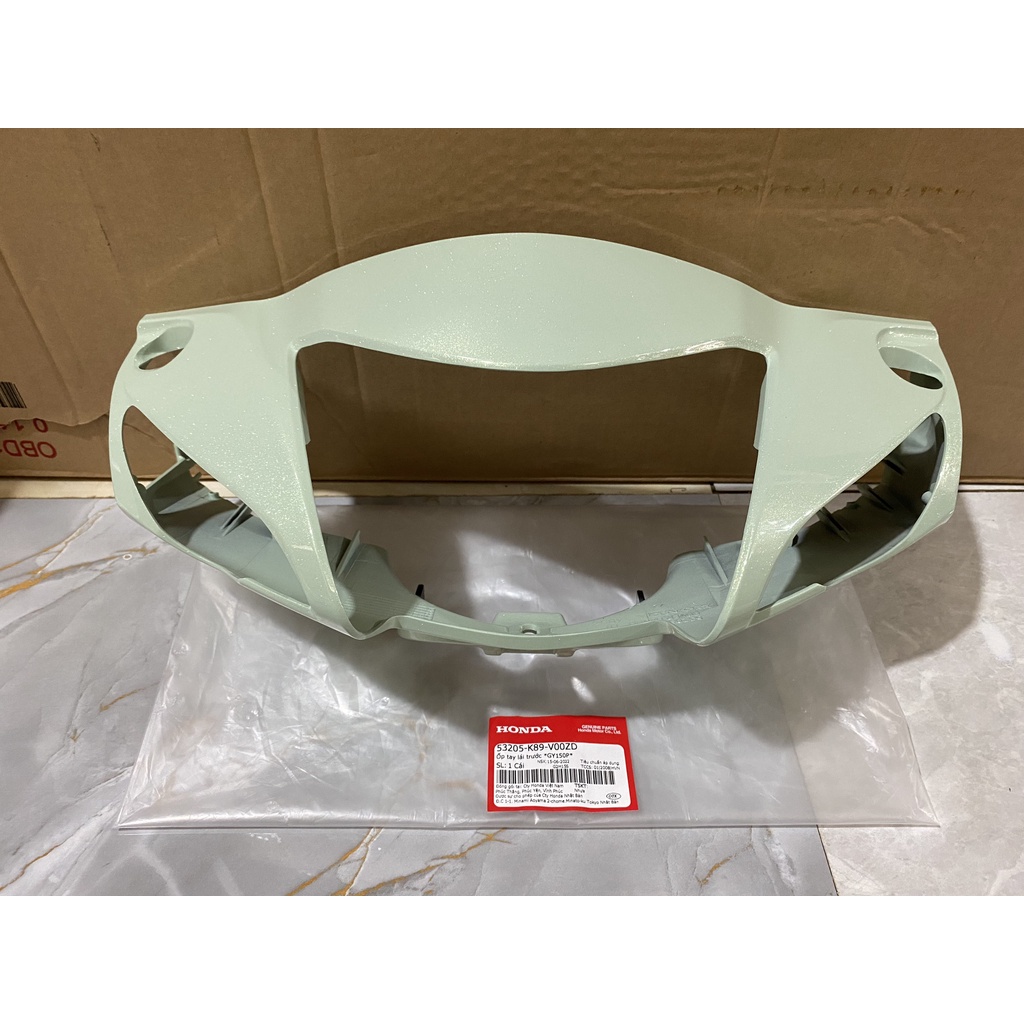Ốp tay lái trước - Bàn thờ HONDA WAVE A110 năm 2017-2018 màu Xanh cốm. (53205K89V00ZD)