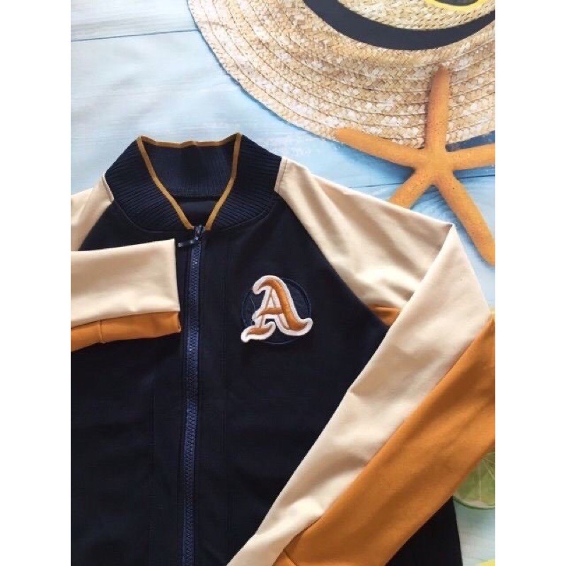 [Mã WASTMAY giảm 15% tối đa 30K đơn 150K] Áo khoác nữ bomber dài tay tím than tay phối cam 1 màu | BigBuy360 - bigbuy360.vn