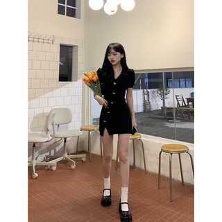 Váy ôm đen đính nơ nổi