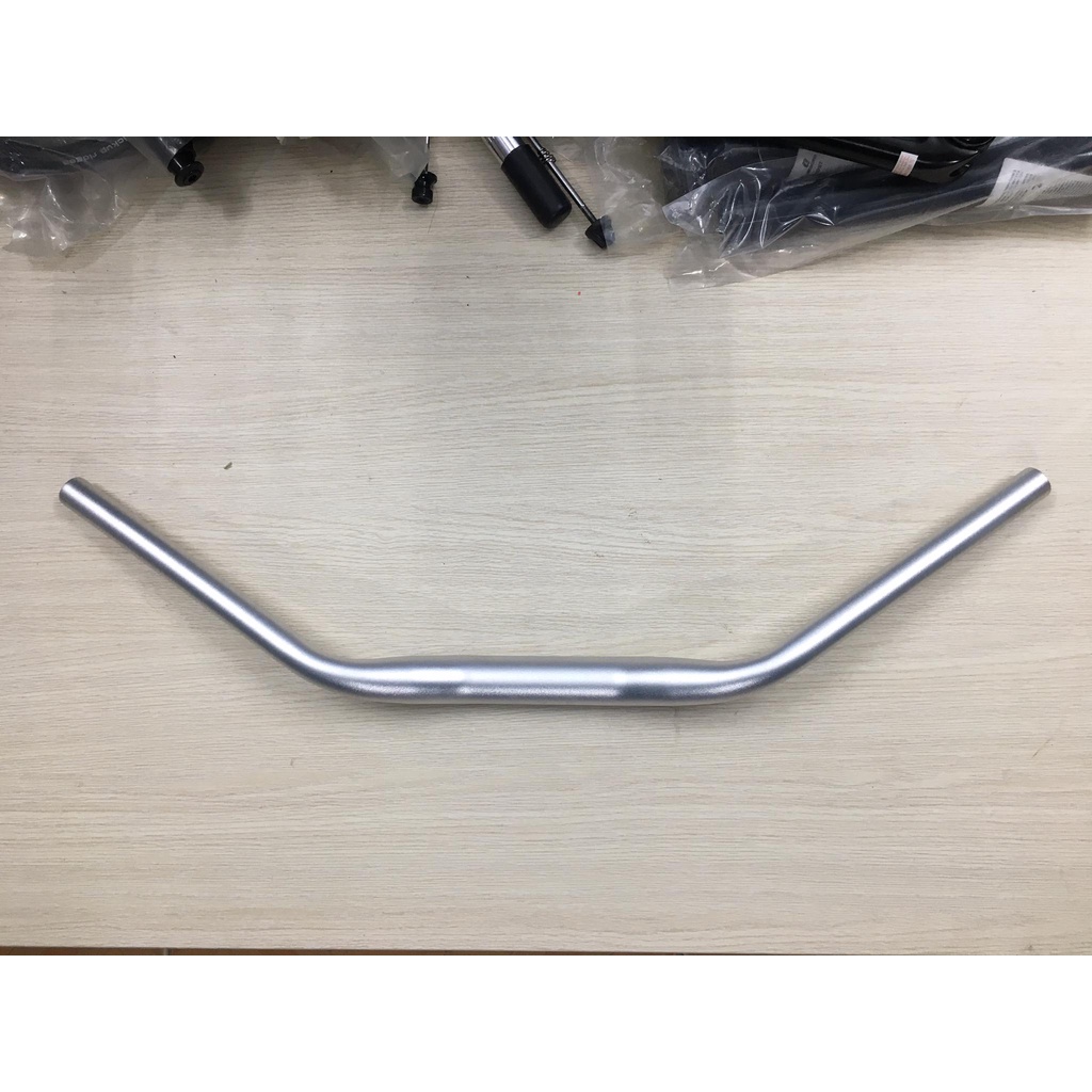 Tay lái / ghi đông VÒNG CUNG ergotec sản xuất Đài Loan , bắt cổ 31,8mm .