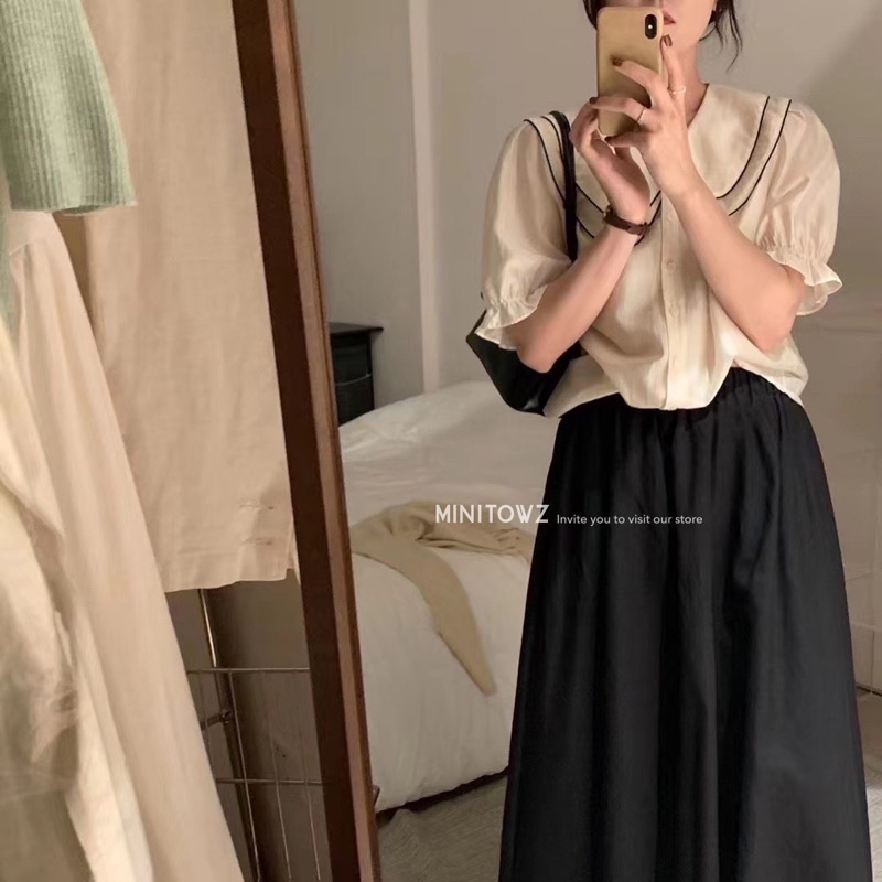 Áo cổ sen viền đen