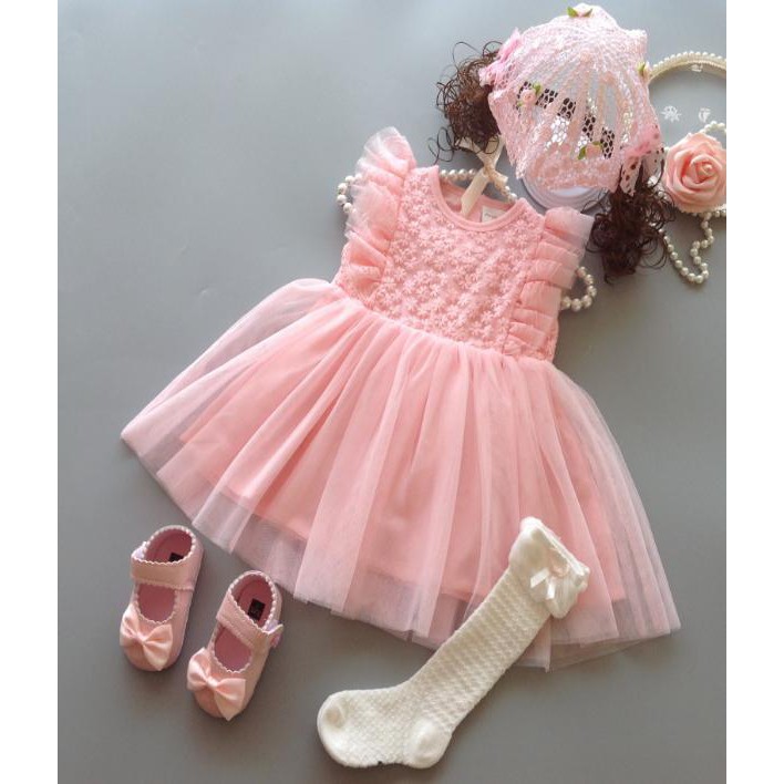 Váy hồng cộc bèo vai cho bé