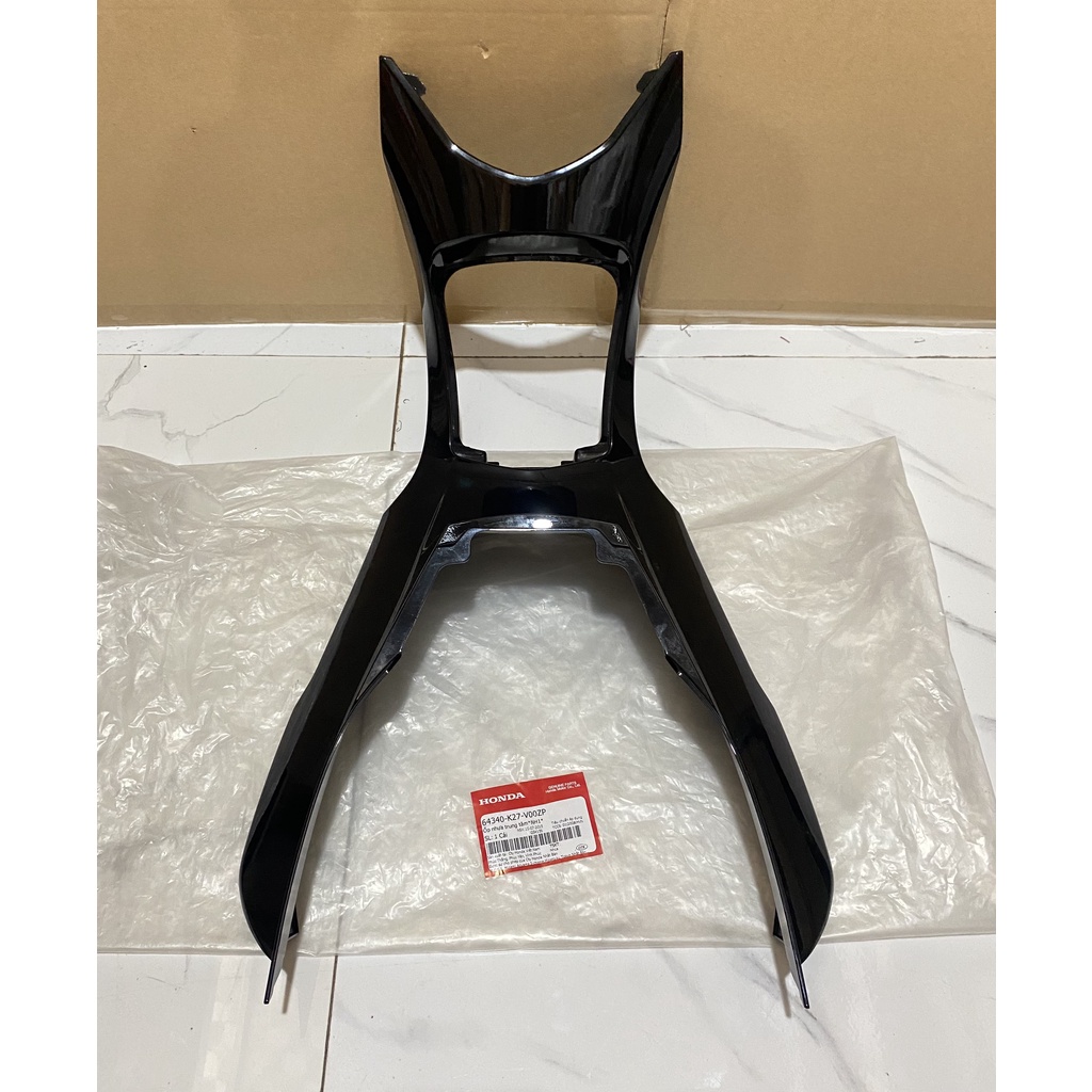 Ốp nhựa trung tâm-Ốp dưới ổ khóa HONDA AIR BLADE 125 năm 2014.