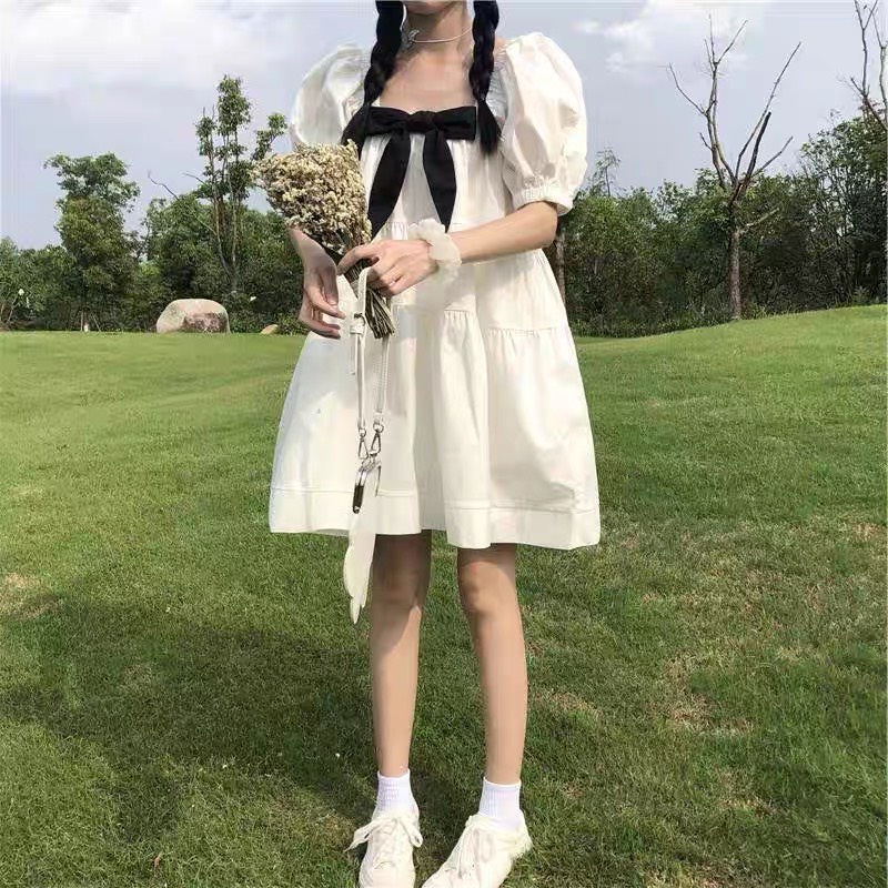 Váy Babydoll Trắng Nơ Đen Tay Bồng Cổ Chun Cute Hot Hit Đầm Nữ Dáng Lỡ Trễ Vai Cute Công Chúa Tiểu Thư Bánh Bèo