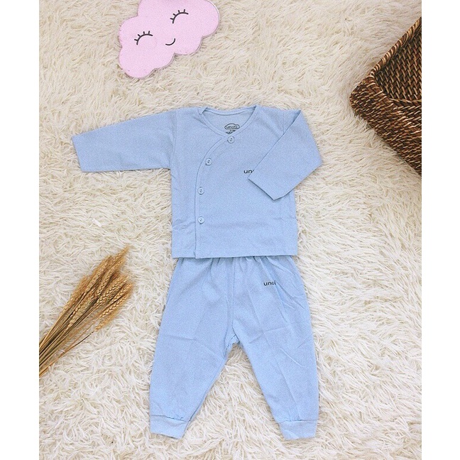 Bộ quần áo unchi cài lệch chất cotton mền mại cho bé