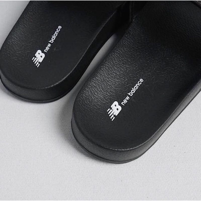Dép New balan - lều người