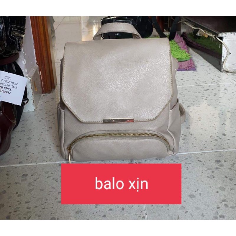 túi cũ hàng si(màu trên hình do có ánh sáng nên sẽ sáng màu hơn thực tế)