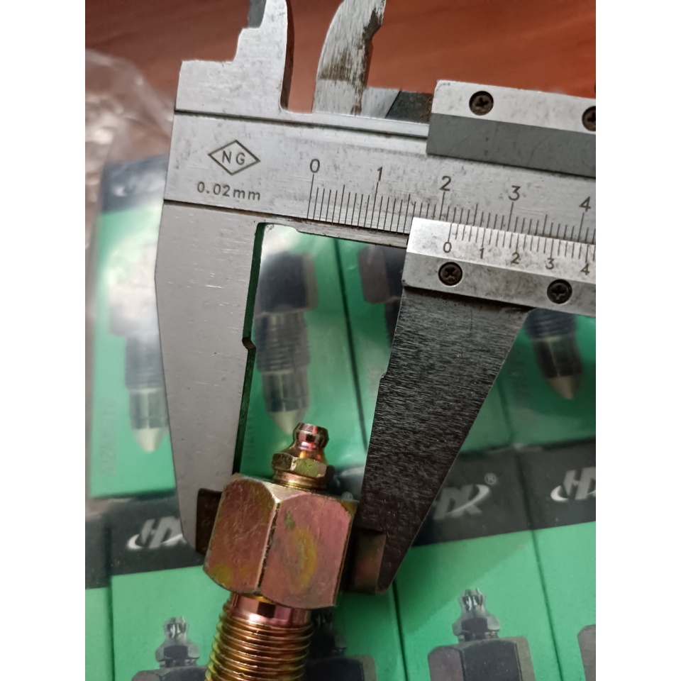 Vú mỡ tăng xích Kobelco