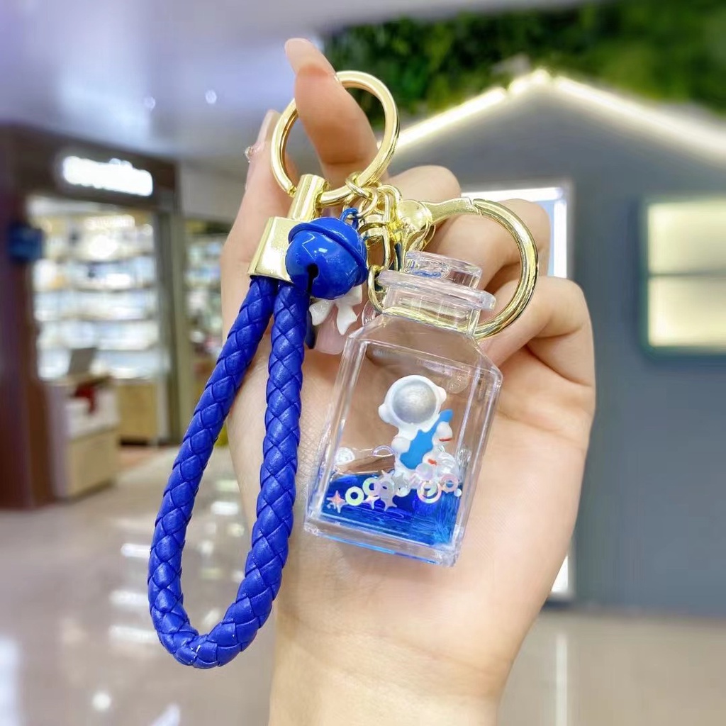 Móc khóa bình nước Phi hành gia xanh dương nhiều kiểu dáng độc đáo làm quà tặng bạn bè người thân móc túi balo -Ráp