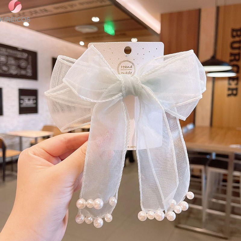 Kẹp Tóc Nơ Voan Tiên Nữ Đính Châu Tua Rua Xinh Xắn Lãng Mạn