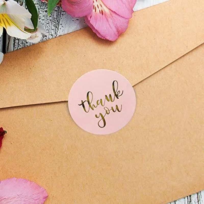 Cuộn 500 sticker in chữ "Thank you" màu vàng nền hồng